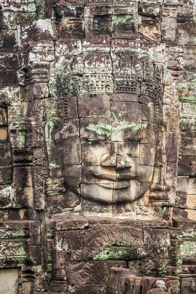 facce di antico Bayon tempio a Angkor cosa, siem raccogliere, Cambogia foto