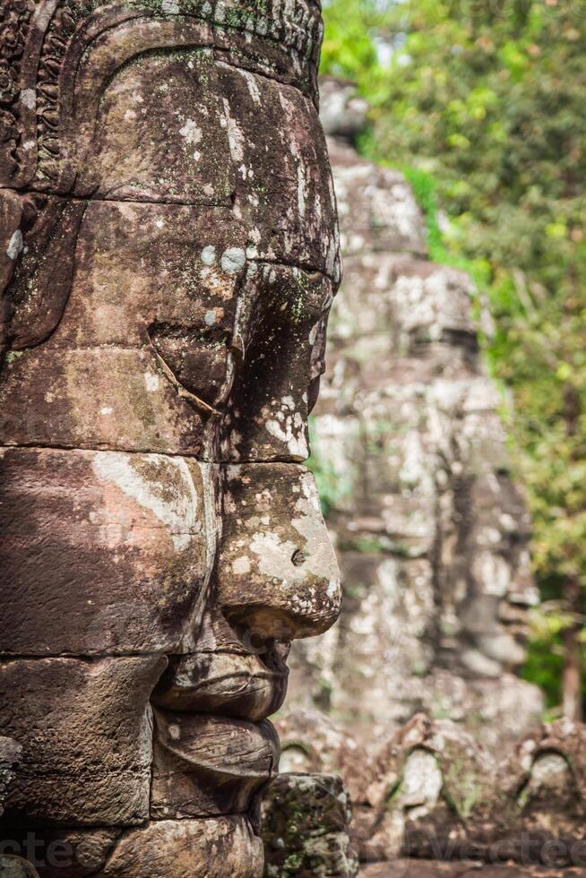 facce di antico Bayon tempio a Angkor cosa, siem raccogliere, Cambogia foto