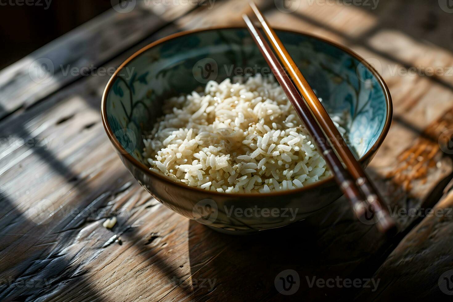ai generato riso nel un' ciotola con bastoncini su un' di legno tavolo foto
