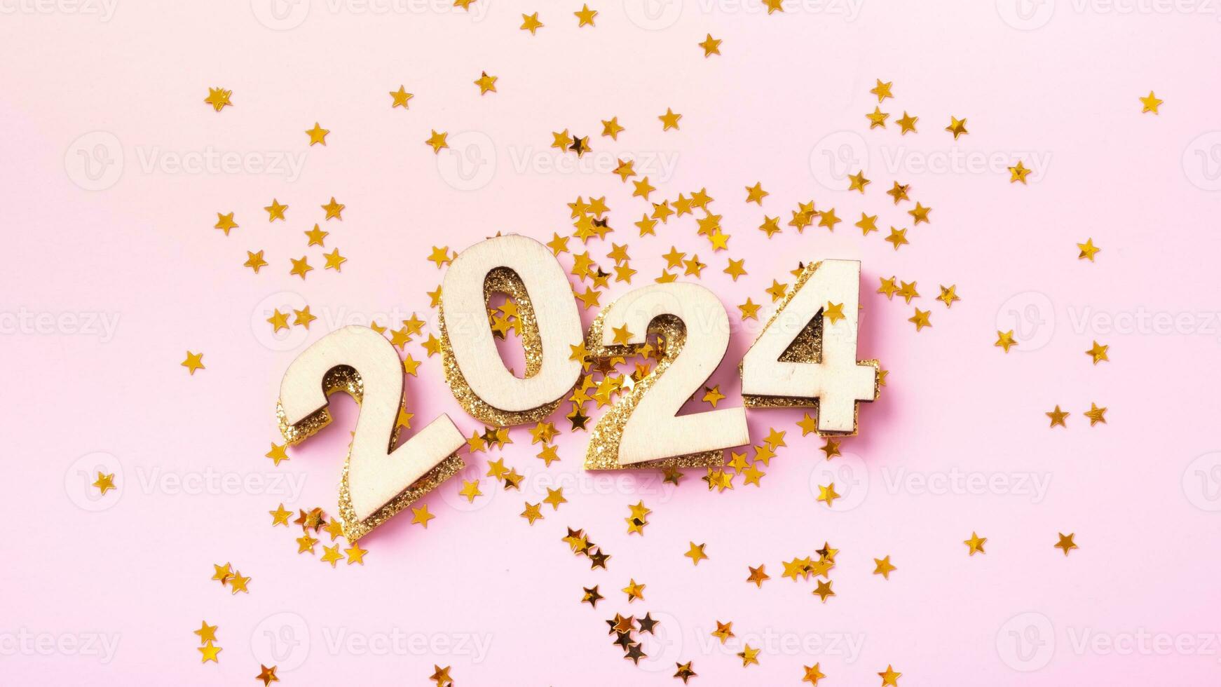 numeri 2024 e stelle su un' rosa sfondo. contento nuovo anno concetto foto