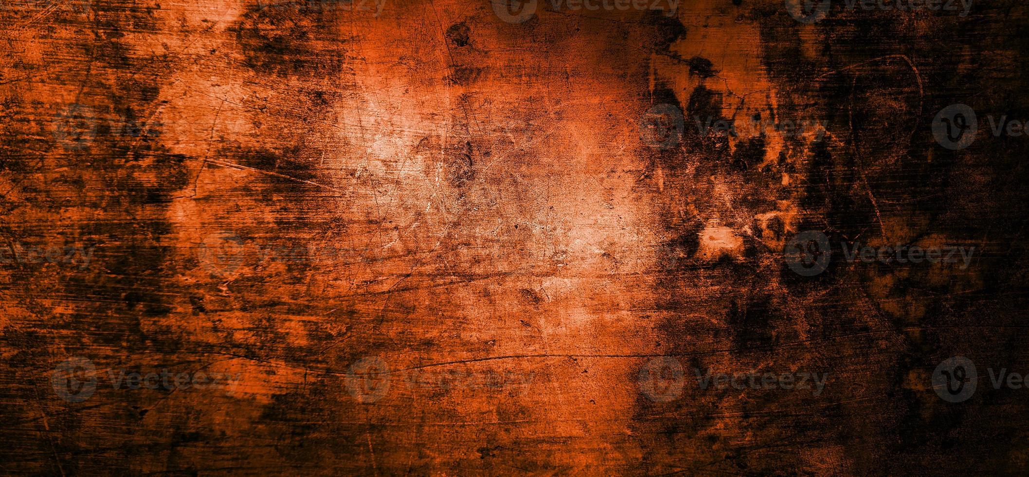 parete arancione con ombre scure. cemento arancione scuro per lo sfondo foto