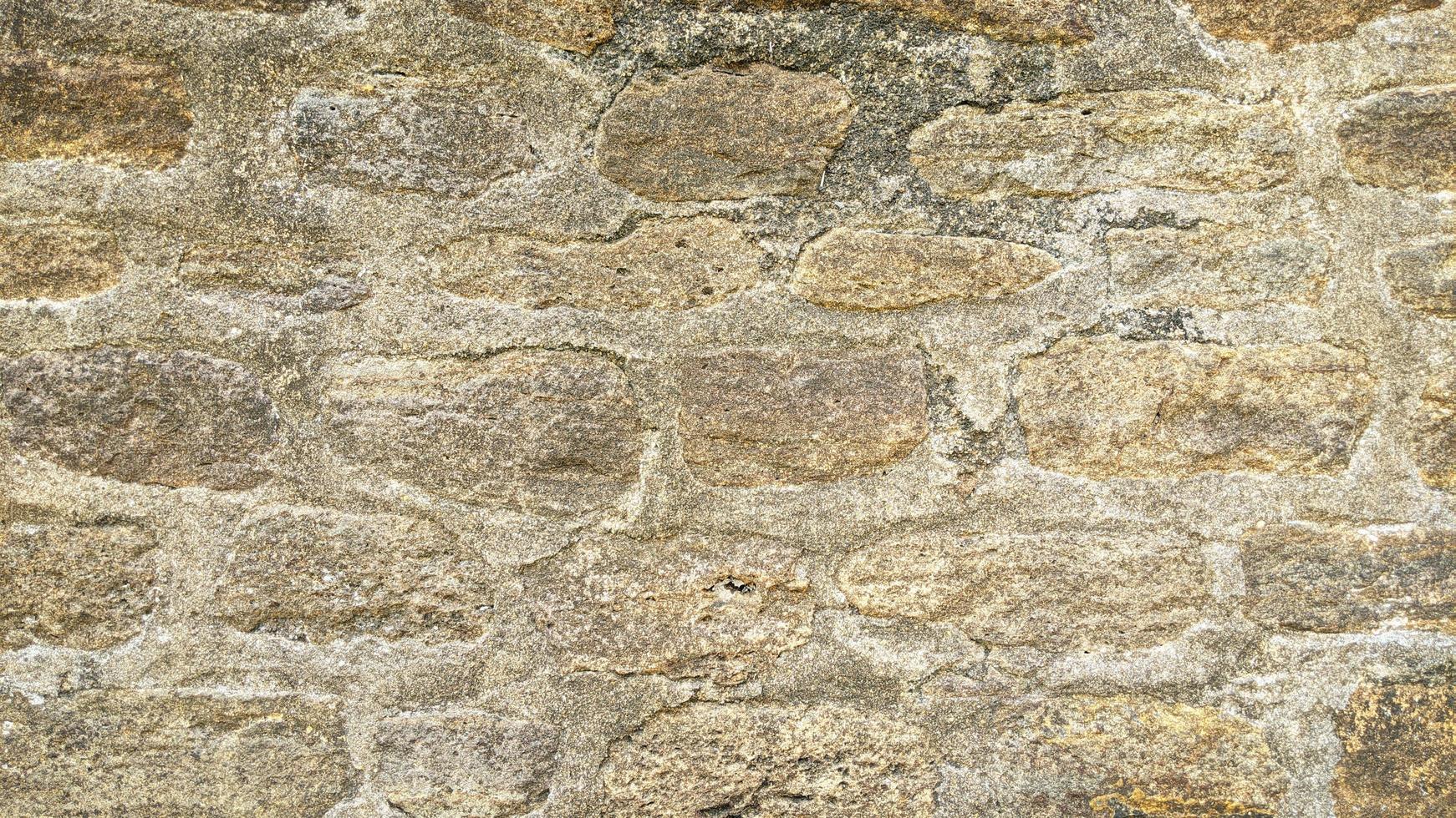 trama di sfondo del vecchio muro di pietra foto