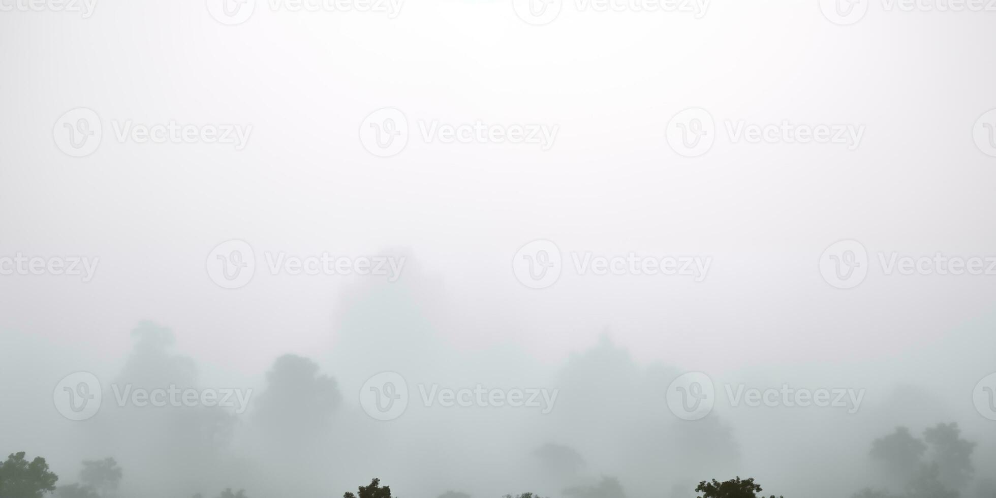 ai generato leggero nebbioso sfondo con copyspace, panoramico Visualizza di nebbioso montagna paesaggio nel il mattina foto