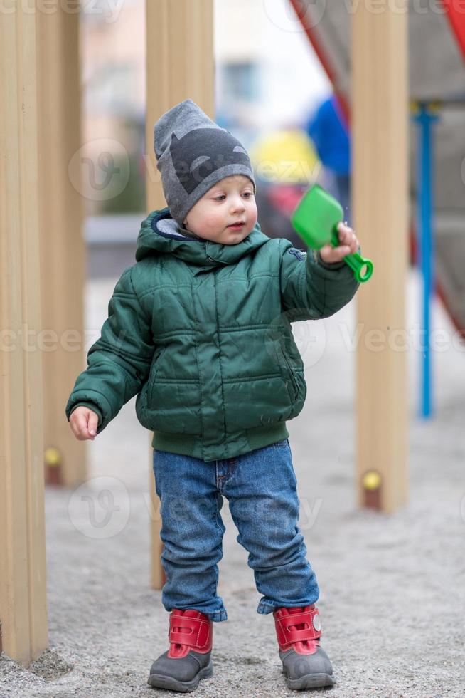 bellissimo bambino con la faccia da bambino in posa fotografo foto