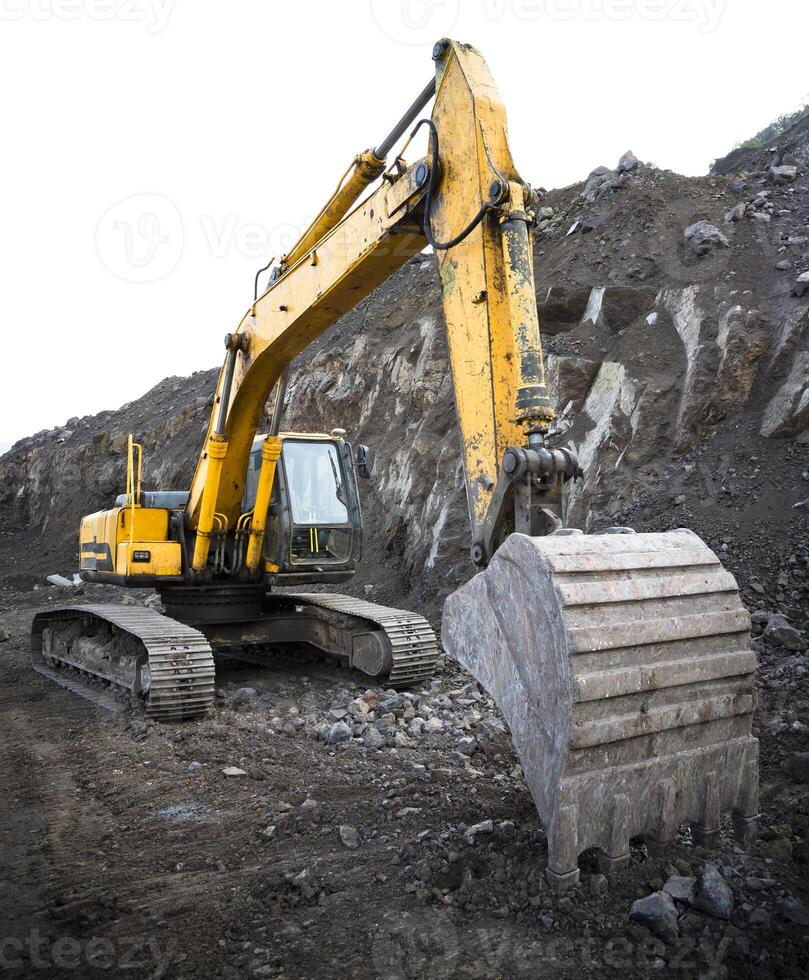 giallo scavatrice , tonica foto