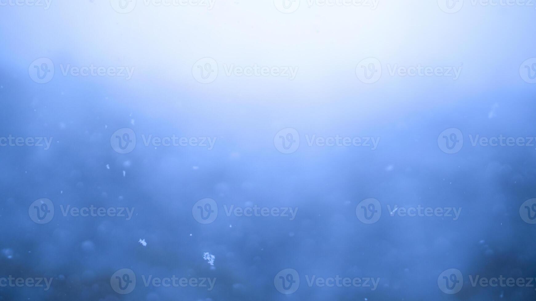 blu nevicata sfondo effetto. astratto dinamico energia sfondo. superficiale profondità di campo con morbido messa a fuoco. foto
