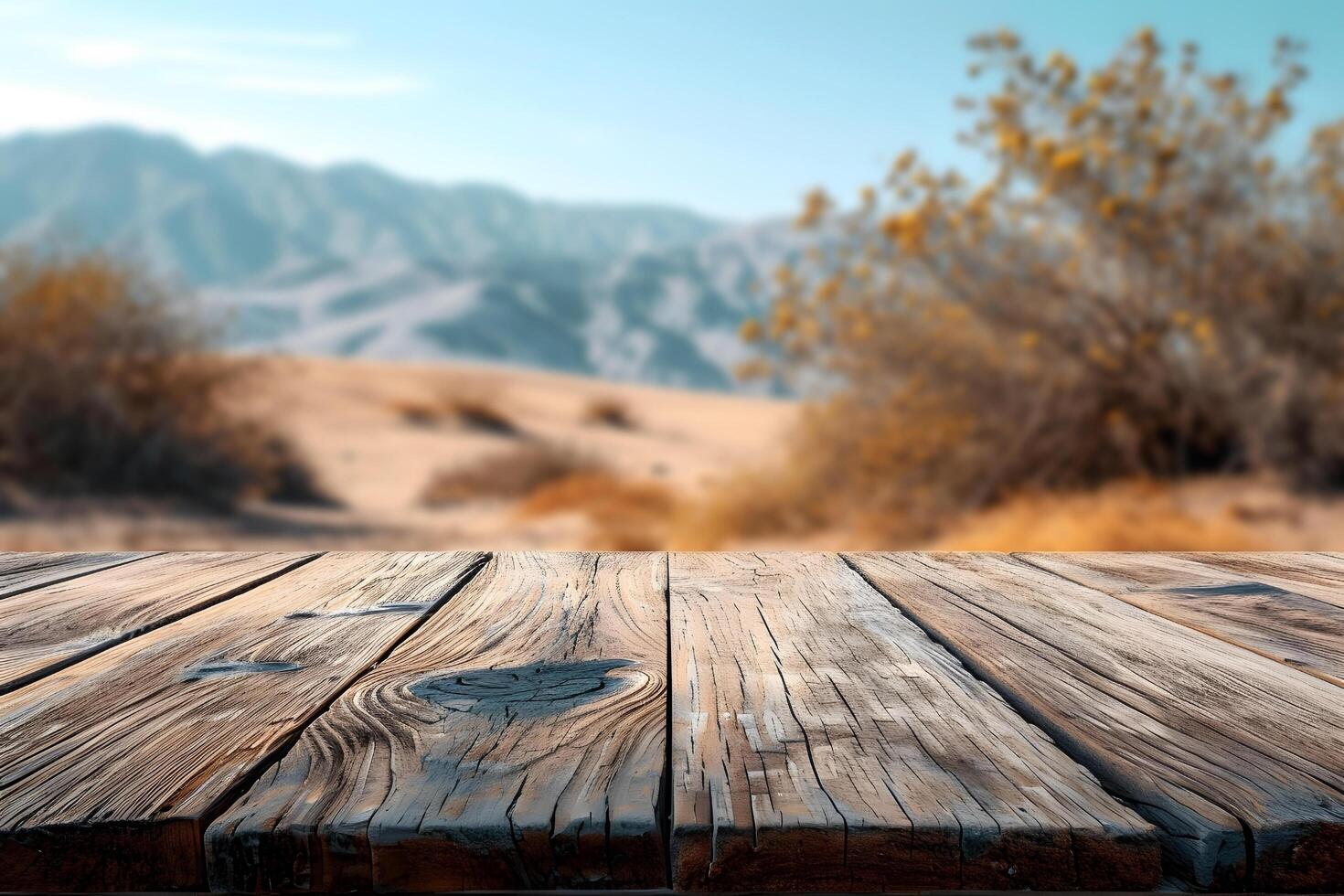 ai generato vuoto di legno tavola pavimento primo piano con sfocato deserto e montagne foto