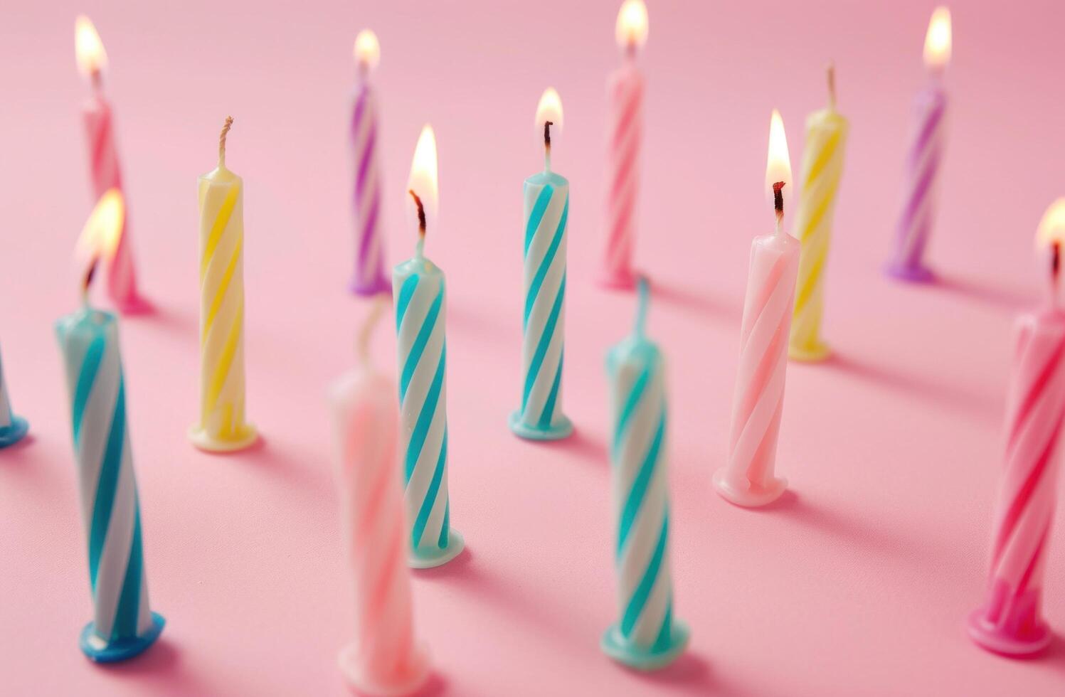 ai generato compleanno colorato candele disposte su un' rosa sfondo foto