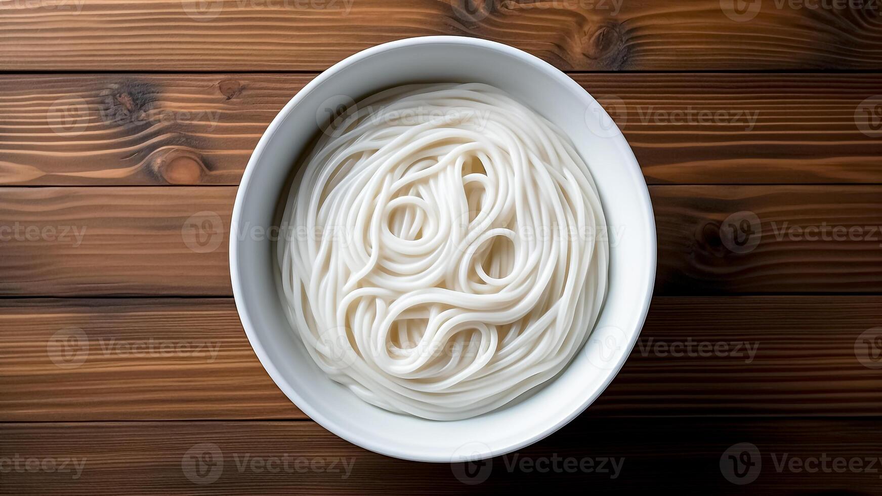 ai generato bianca spaghetto nel un' ciotola su di legno tavolo. superiore Visualizza. minimalista cucina. foto