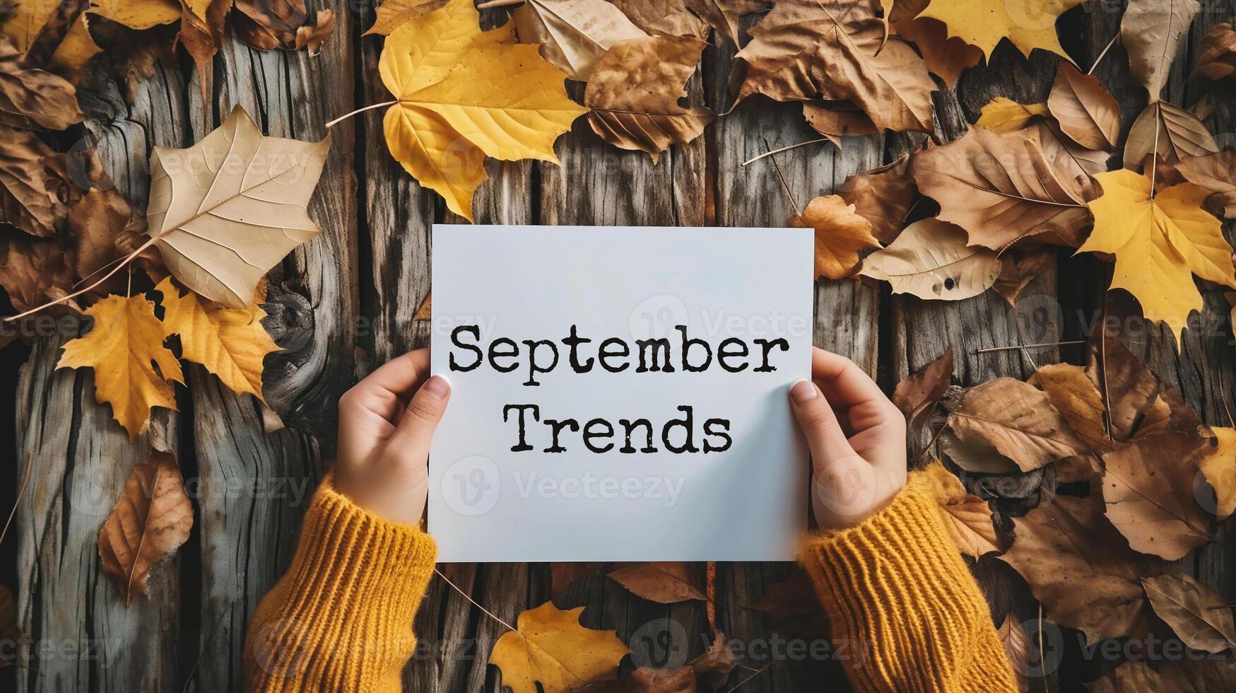 ai generato superiore Visualizza di donna Tenere carta con settembre tendenze lettering su di legno sfondo foto