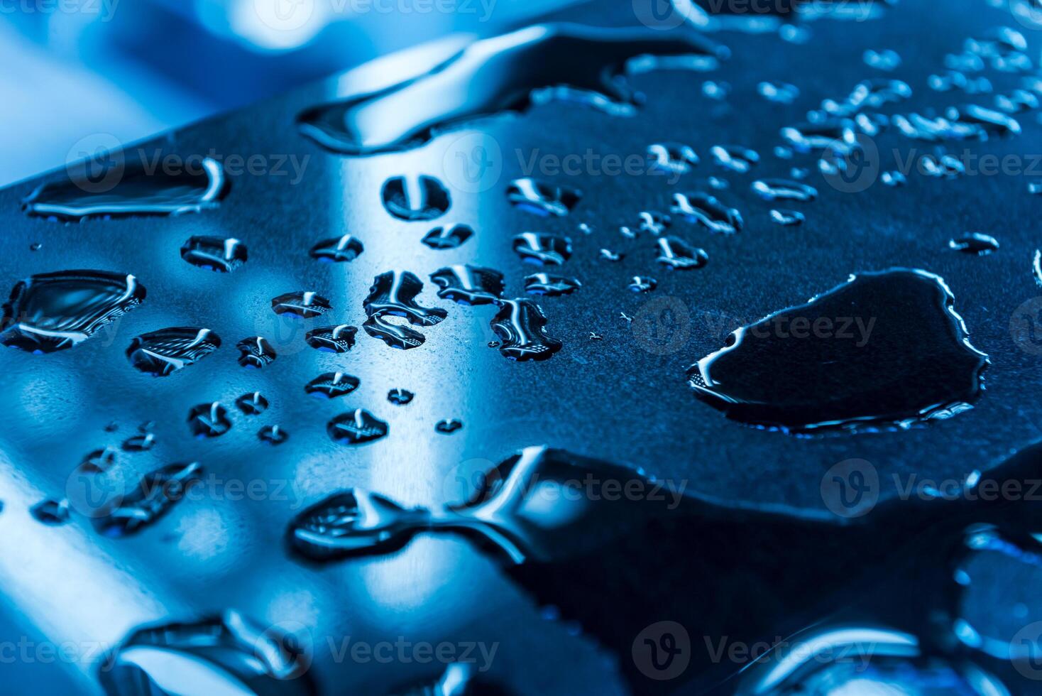 gocce di acqua ha diffusione su il superficie foto