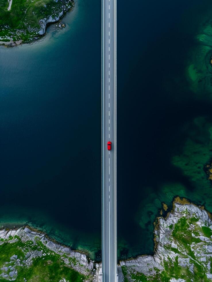 ai generato aereo Visualizza cattura lungo ponte quello tratti attraverso buio blu corpo di acqua ai generato foto