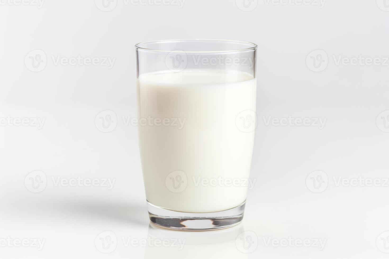 ai generato avvicinamento di latte bicchiere su bianca sfondo. foto