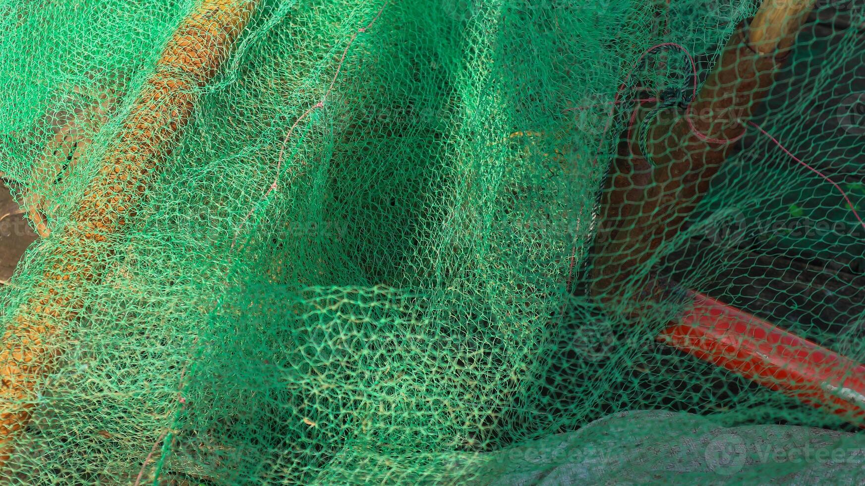 verde pesca rete. verde mucchio di commerciale pesca rete. foto