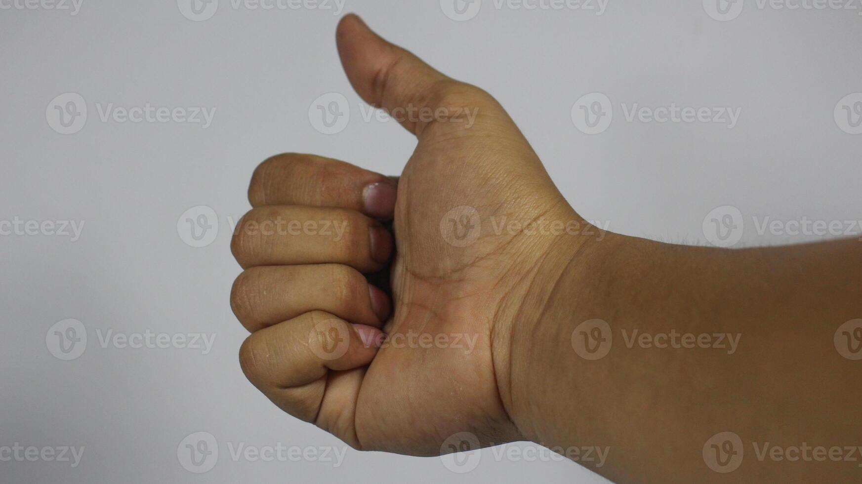 giusto mano gesti con pollice. isolato su bianca sfondo foto