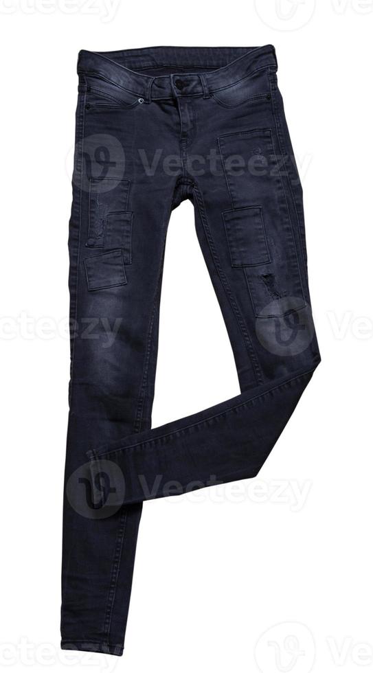 denim sottile nero isolato su bianco, jeans neri da vicino foto