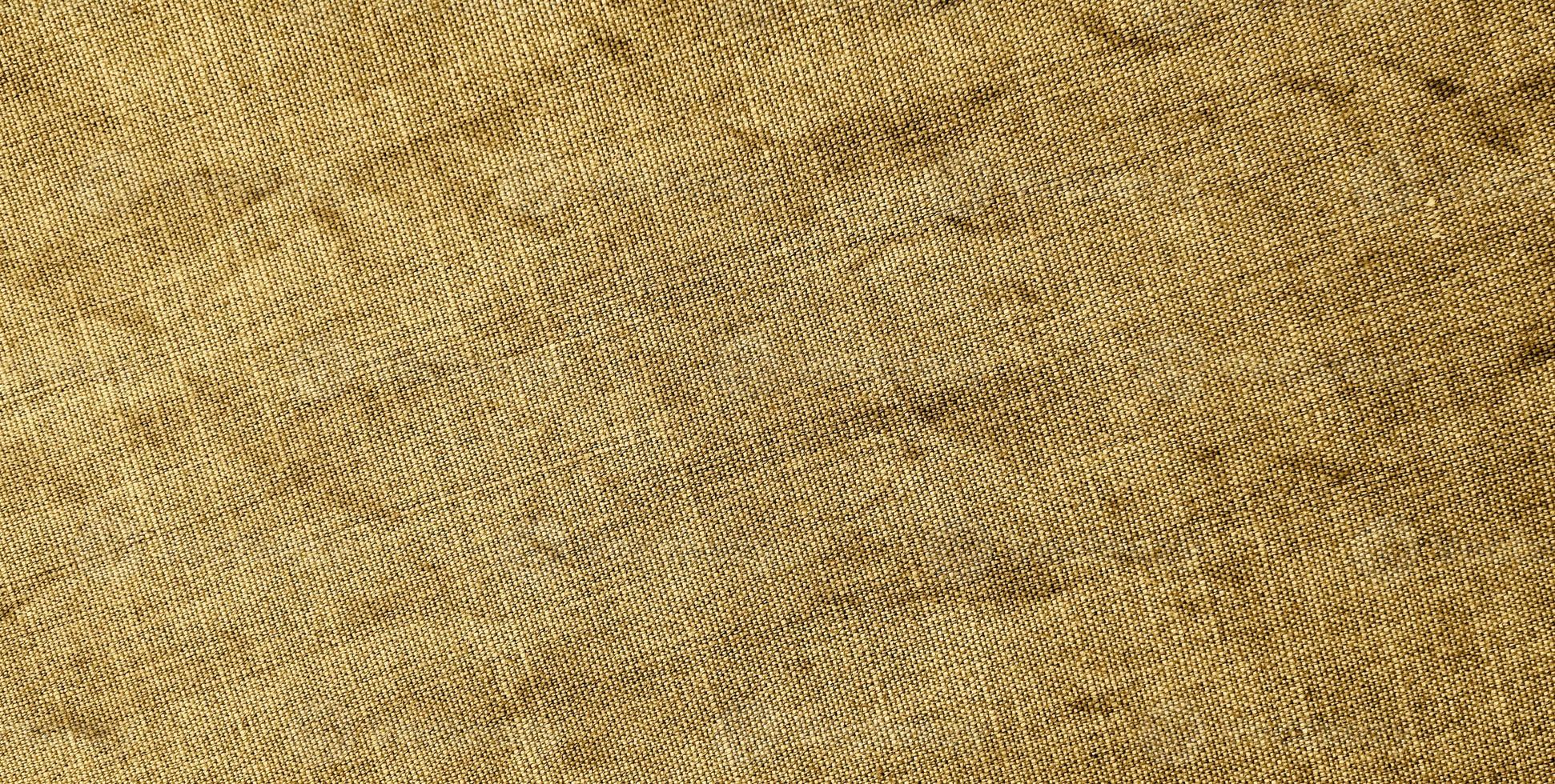 tessuto naturale di cotone o lino. trama del tessuto grunge per lo sfondo foto