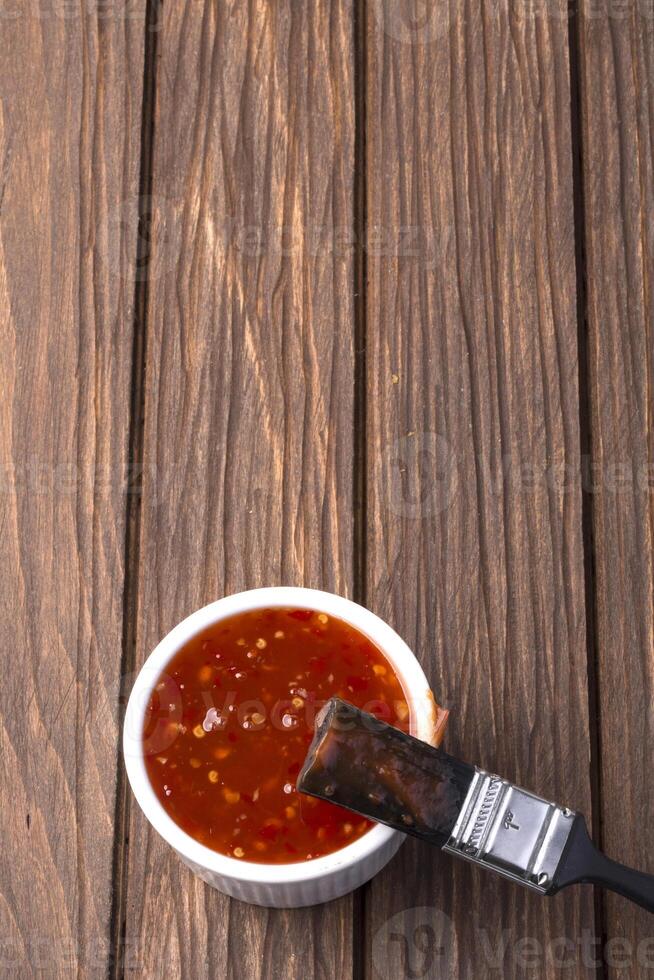 barbecue salsa con imbastitura spazzola foto
