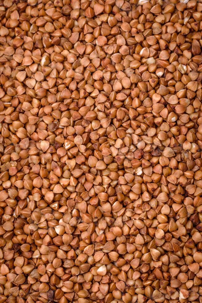 grande cereali di crudo grano saraceno porridge siamo Marrone nel colore foto