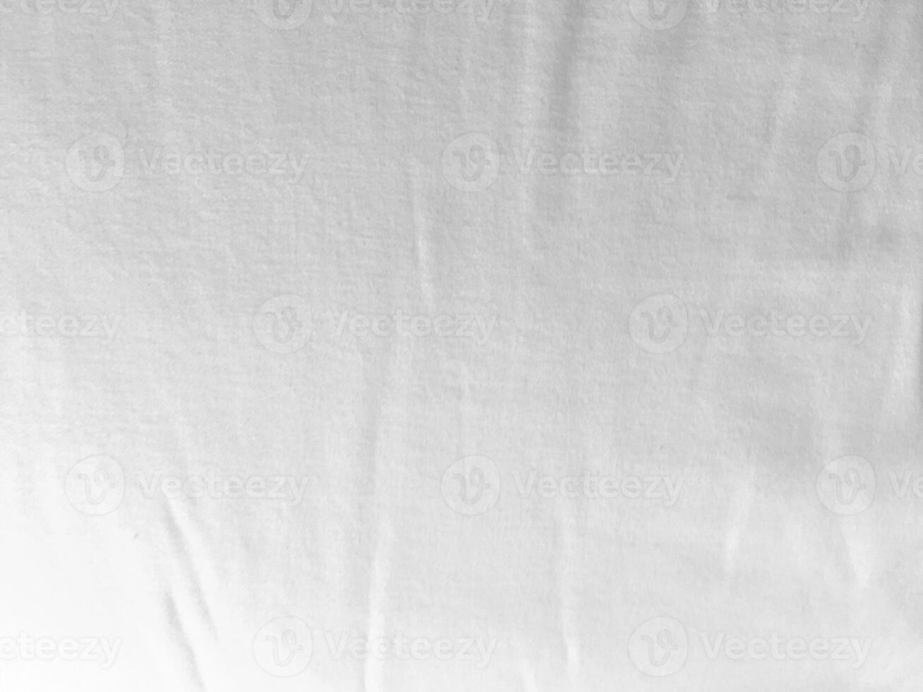 un' incontaminato bianca tessuto sfondo in mostra il lussuoso struttura di seta, la creazione di un astratto e morbido ambiance Perfetto per un' fascia alta design. foto