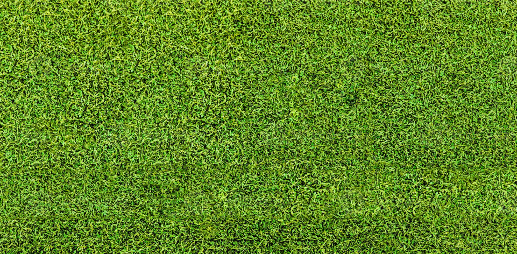 verde erba struttura sfondo. artificiale verde erba. foto