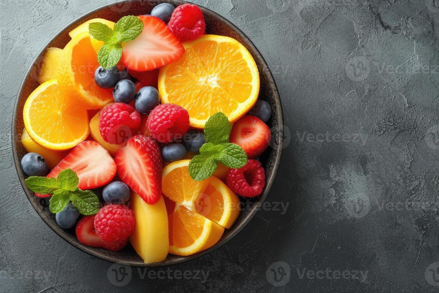 ai generato fresco misto frutta insalata nel un' ciotola professionale pubblicità cibo fotografia foto