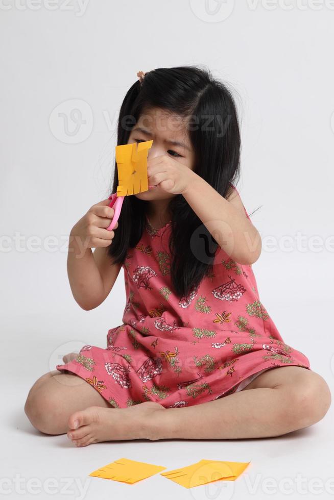 bambino asiatico giocherellone foto