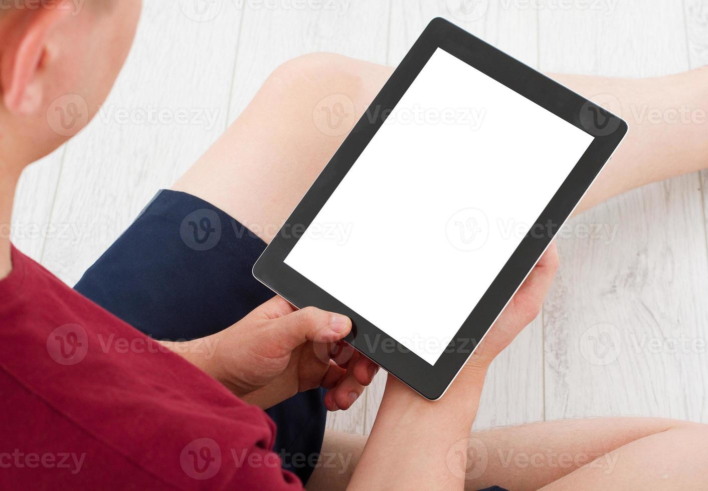 uomo seduto con tablet in mano. shopping online.vista dall'alto.mock up.copy space.template.blank. foto