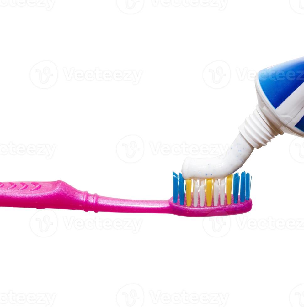spremitura dentifricio su spazzolino foto