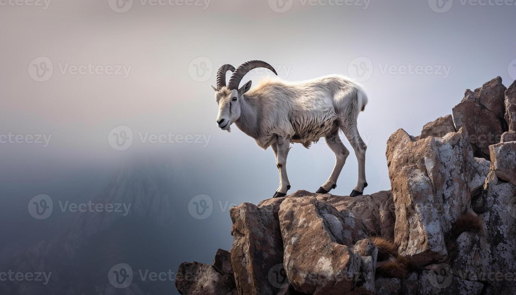 ai generato cornuto capra in piedi su montagna picco, esplorando natura generato di ai foto