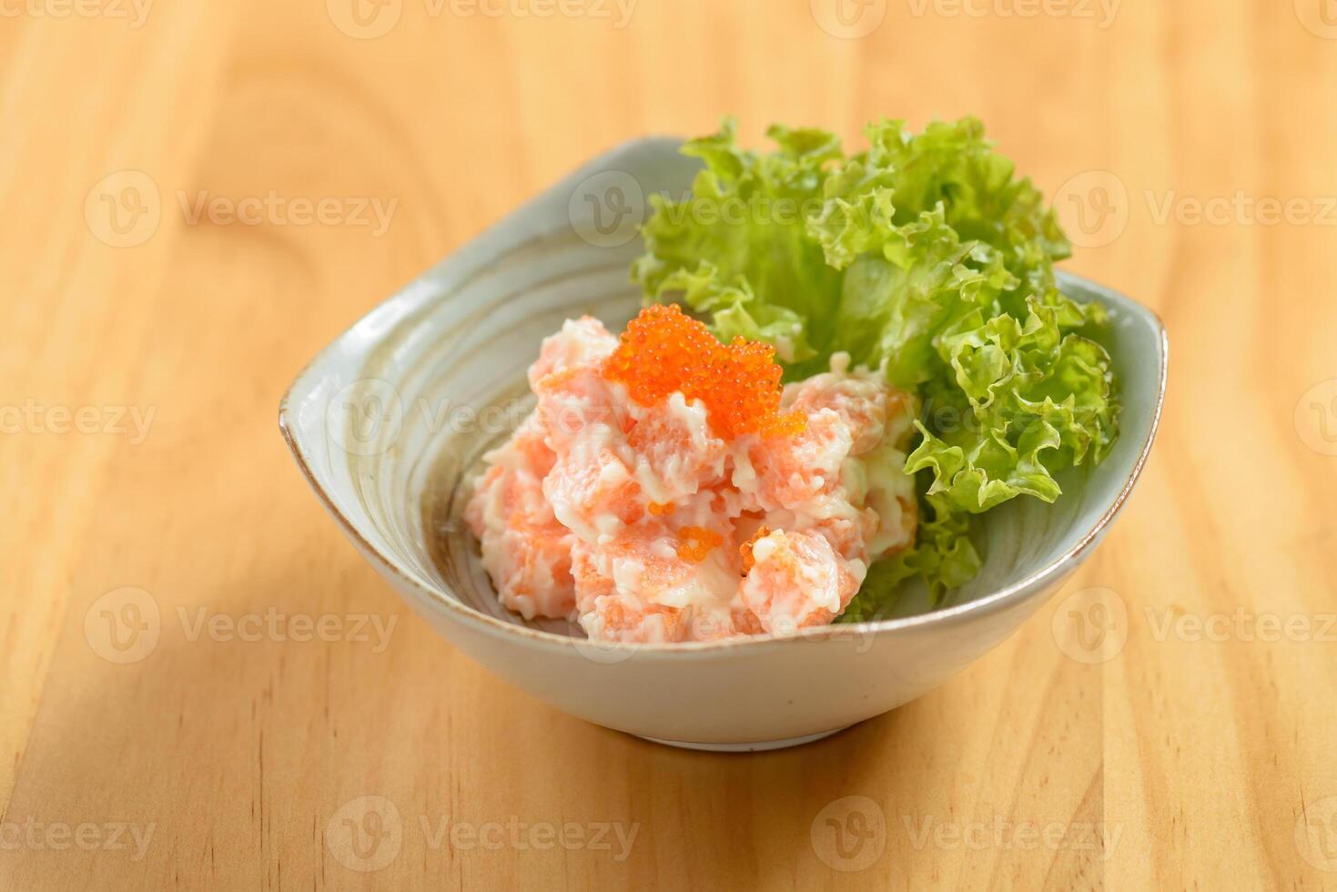 giapponese cibo shishamo mentai salsa nel un' ciotola isolato su di legno sfondo superiore Visualizza foto