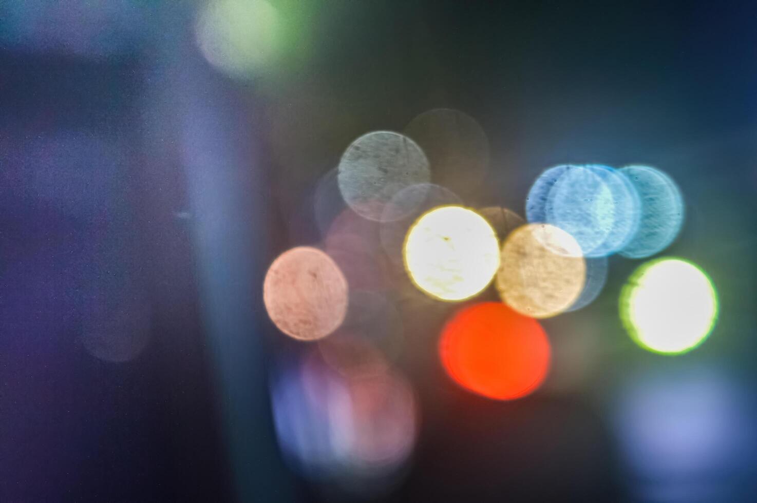 sfondo di colorato bokeh leggero e sfocatura a notte foto