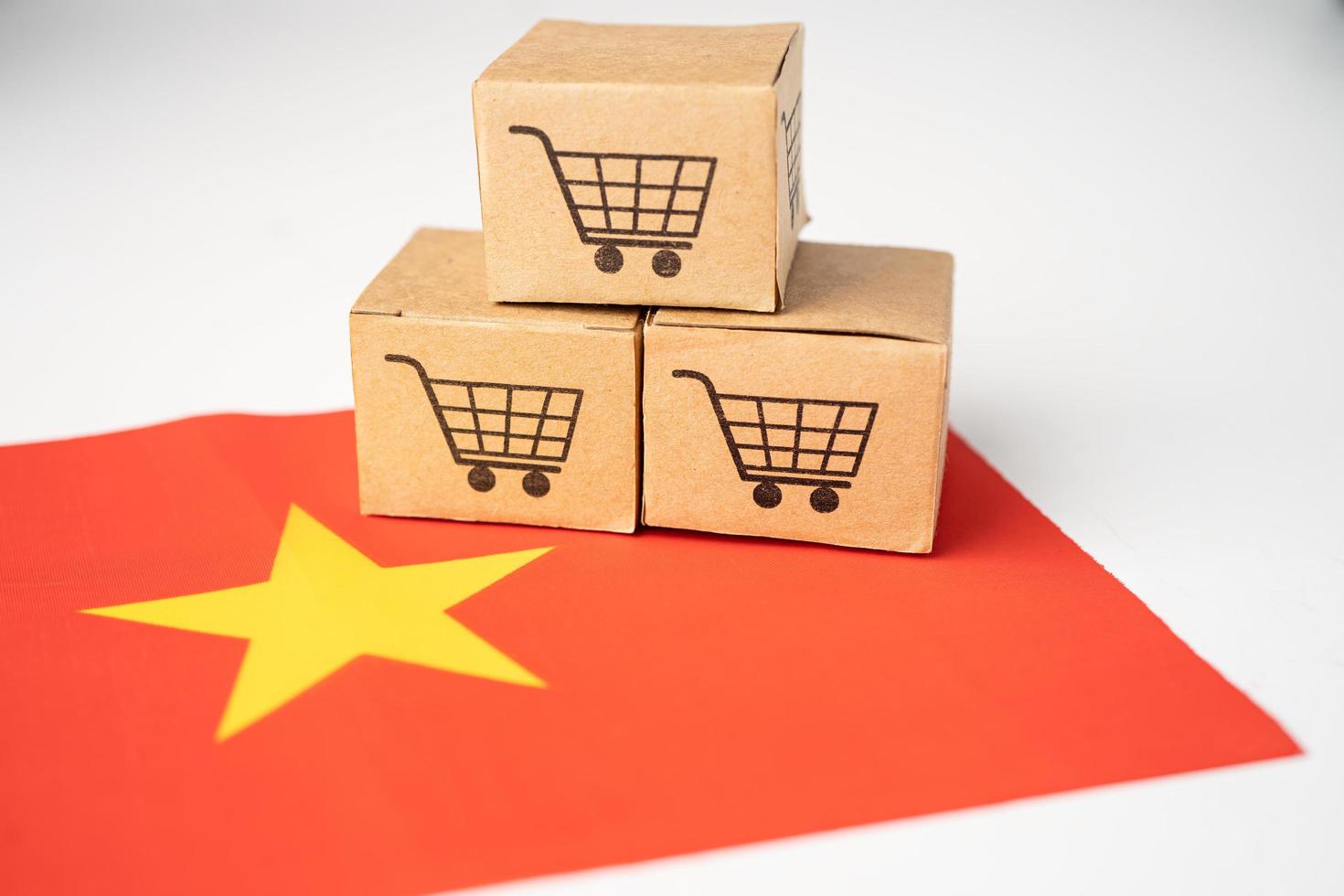 scatola con logo carrello della spesa e bandiera della Cina, import export shopping online o e-commerce servizio di consegna finanza negozio spedizione prodotto, commercio, concetto fornitore. foto