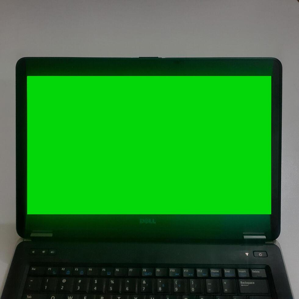 verde schermo il computer portatile - azione foto