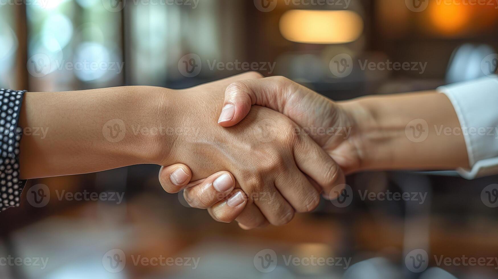 ai generato Due mani tremante mani e fabbricazione un' affare nel un ufficio foto