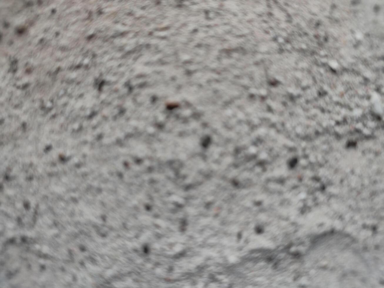 su di messa a fuoco, sfocatura sfondo di rovine consistente di sabbia, mattone, calcolo, polvere e suolo foto