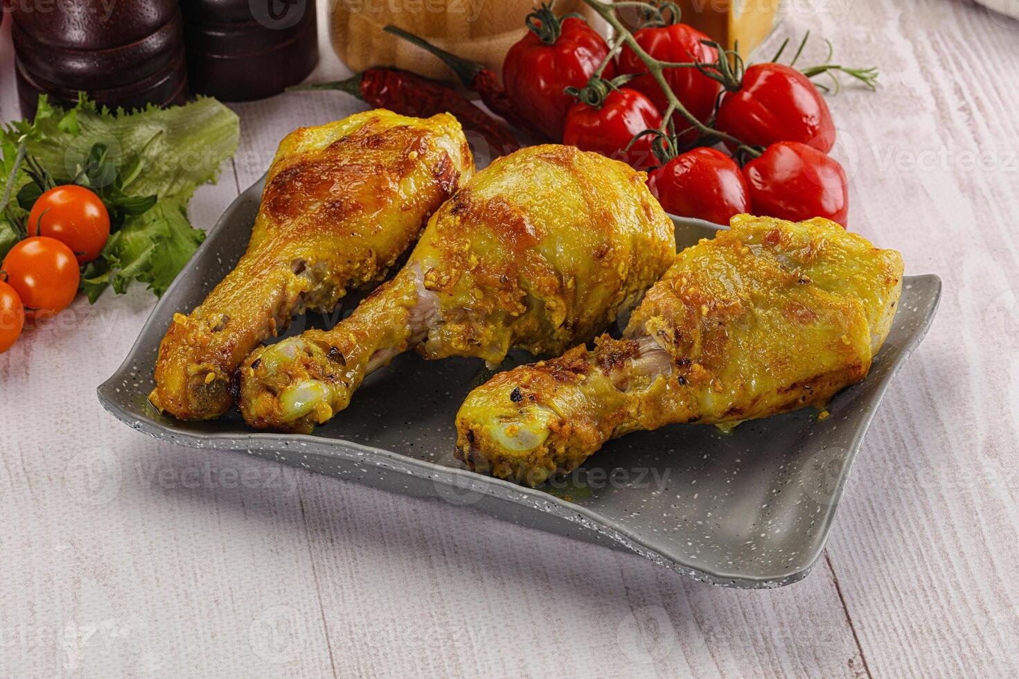 arrostito pollo gamba bacchette con curry salsa foto