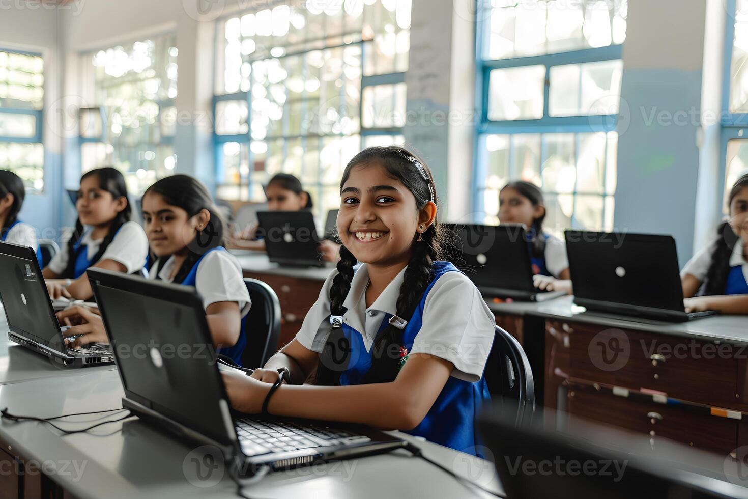 ai generato ritratto di un' sorridente scolara utilizzando il computer portatile nel aula a scuola foto