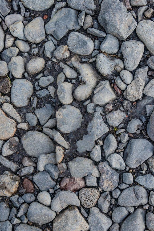 ciottoli di fiume rotondi come sfondo e trama, primo piano, dettagli. foto