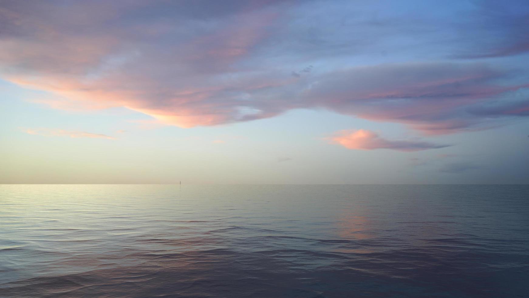 paesaggio marino con cielo rosa pastello foto