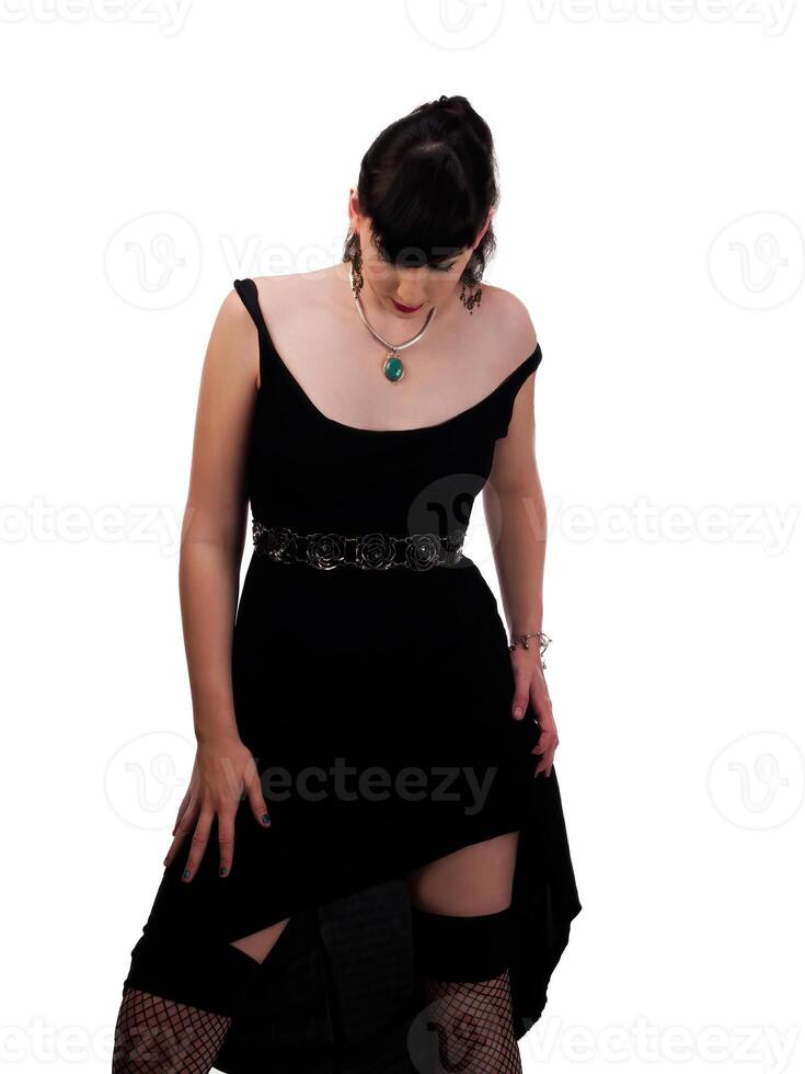 caucasico donna nero vestito e a rete calze autoreggenti foto