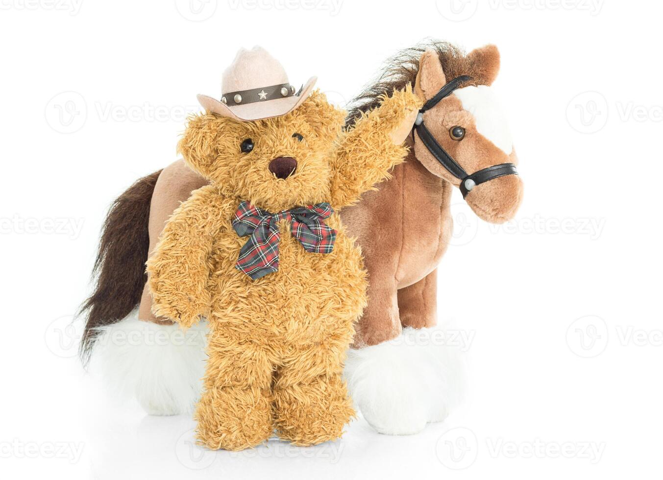 cowboy orsacchiotto e cavallo foto
