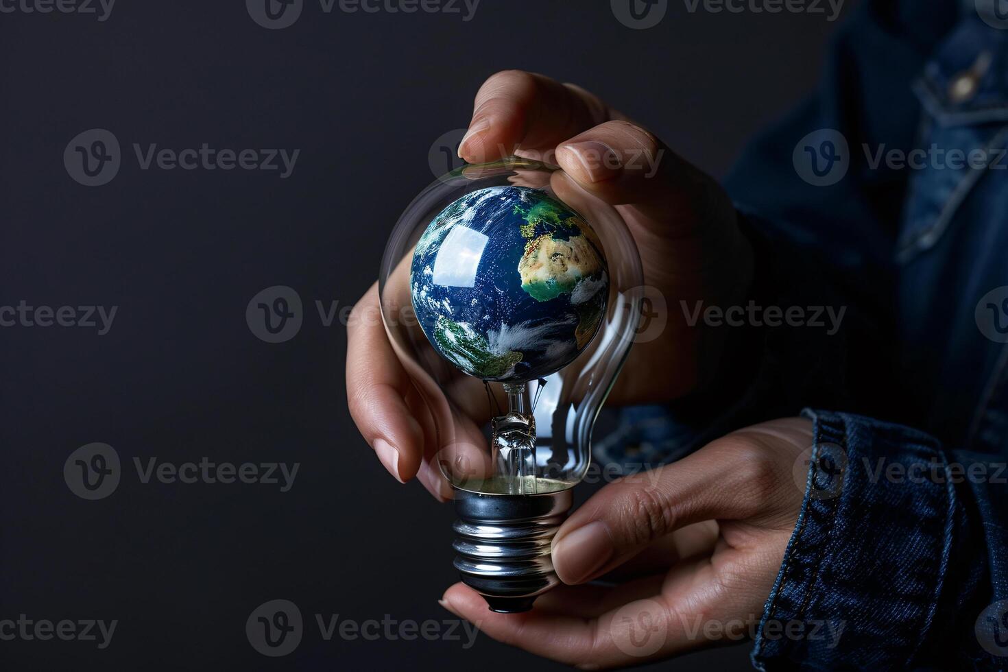 ai generato mano Tenere pianeta terra dentro leggero lampadina foto