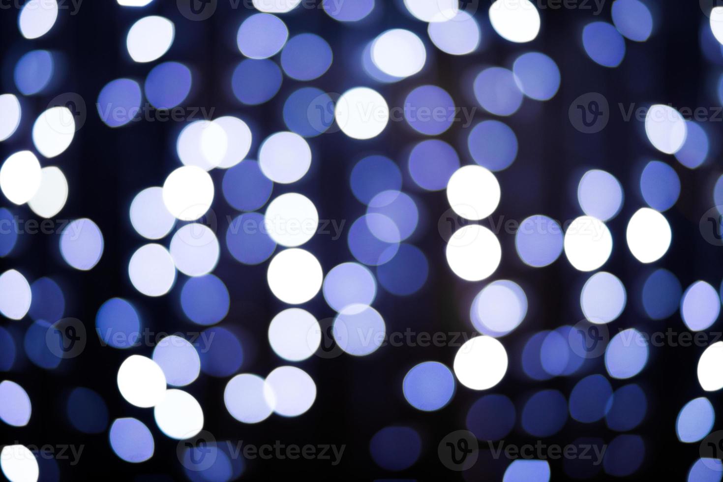 sfocato natale luci blu bokeh di notte foto