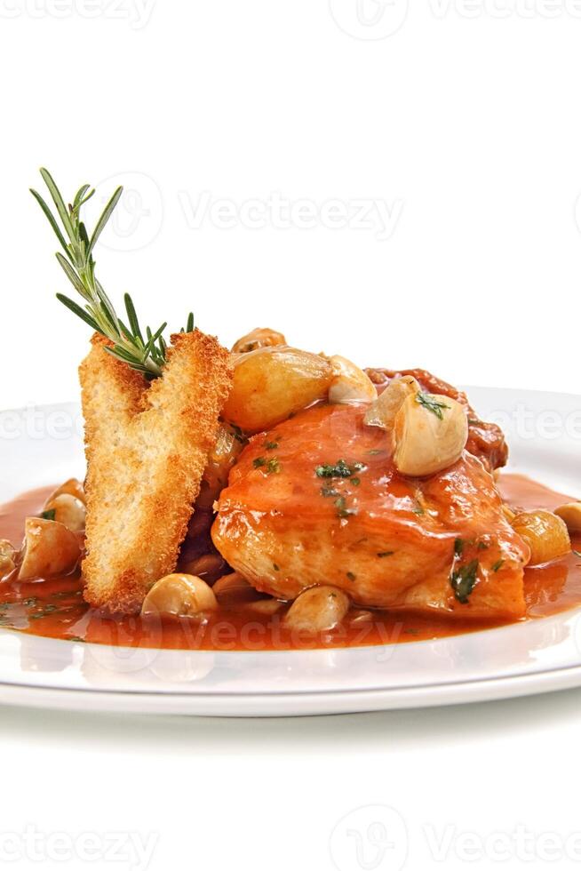 pollo Marengo passo di fare un passo, francese ricetta con erba cipollina, mazzo guarnire, carote, arancia succo e aglio tra altri foto