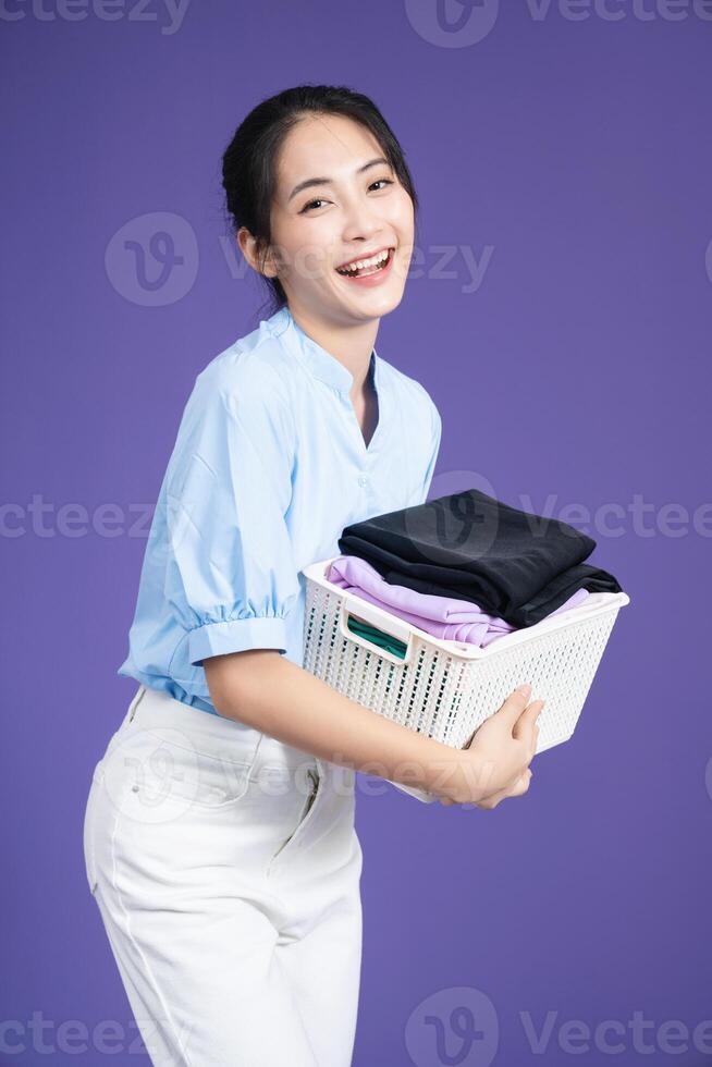 Immagine di giovane asiatico donna su sfondo foto