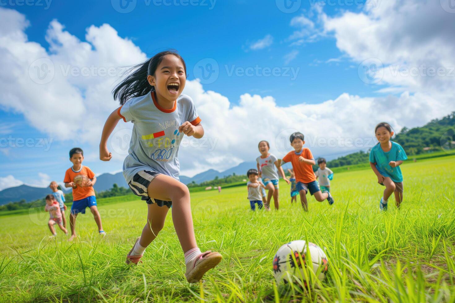 un' gruppo di asiatico bambini giocando calcio foto