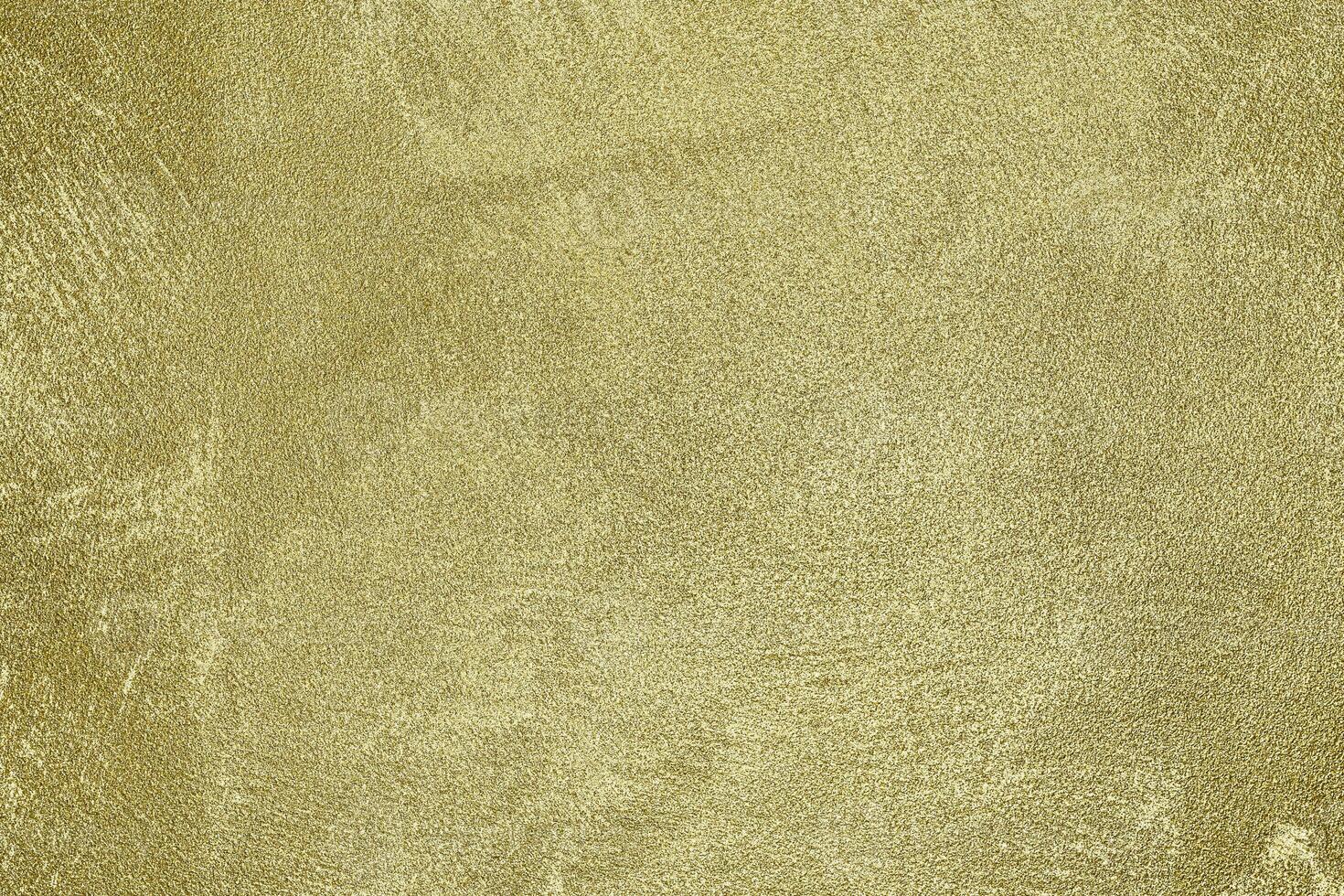 struttura di d'oro decorativo gesso o calcestruzzo. astratto oro grunge sfondo. foto