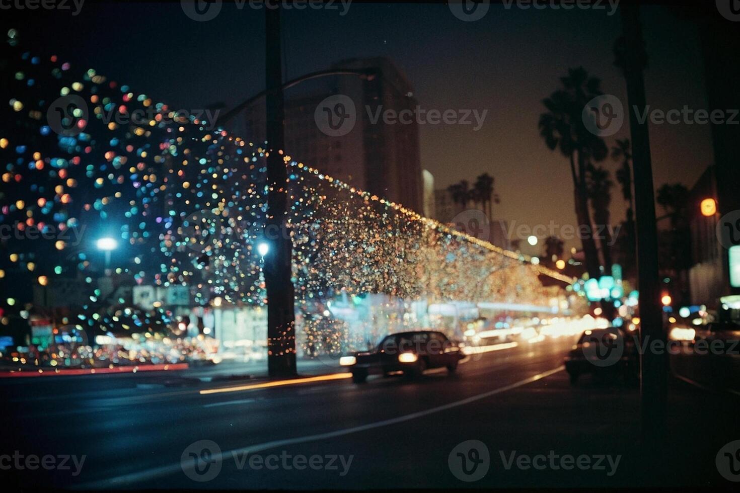 un' auto guida giù un' strada con luci su esso foto