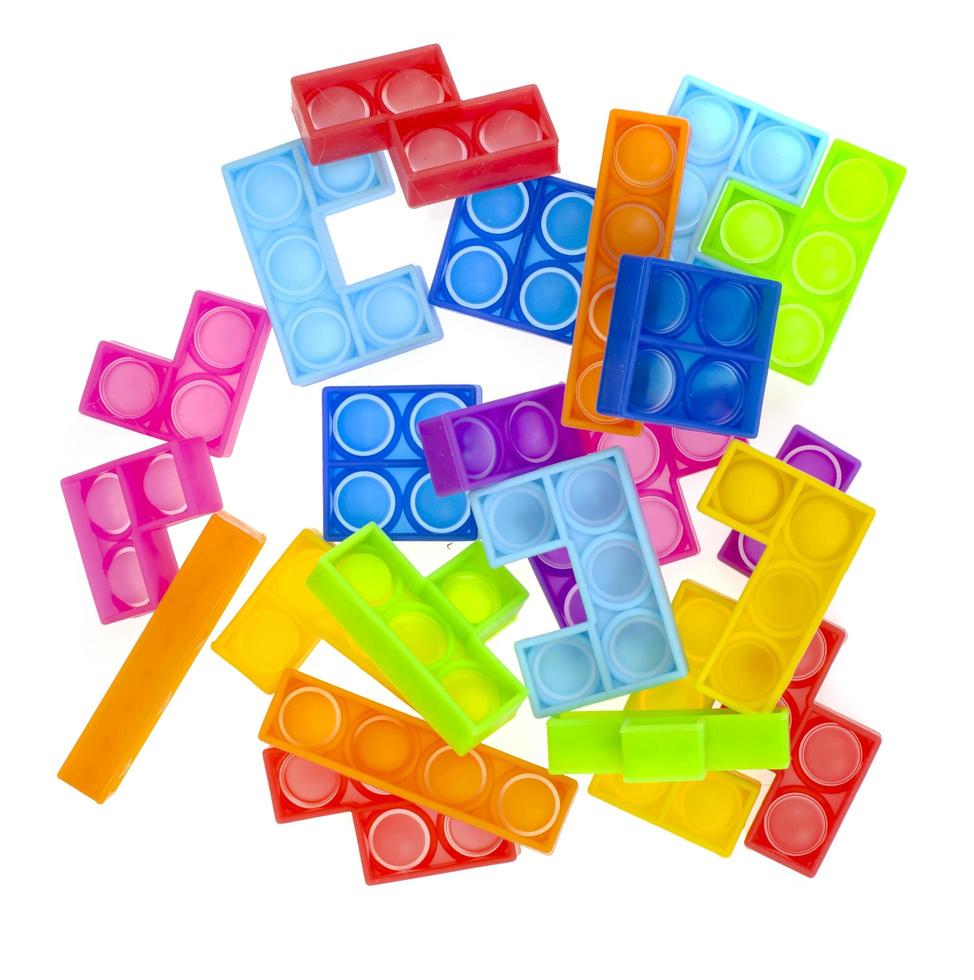 puzzle semplice fossetta, fallo scoppiare. giocattolo antistress alla moda e moderno per bambini e adulti foto